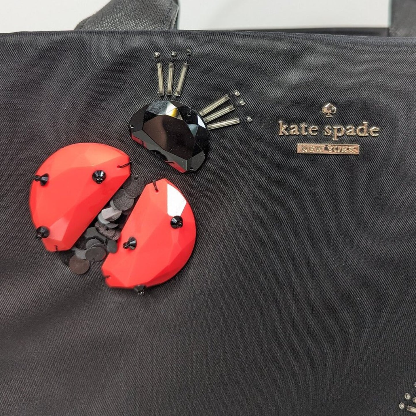 Kate Spade New York Black Nylon Satchel Beaded Sequin Ladybug Accents Zip Top